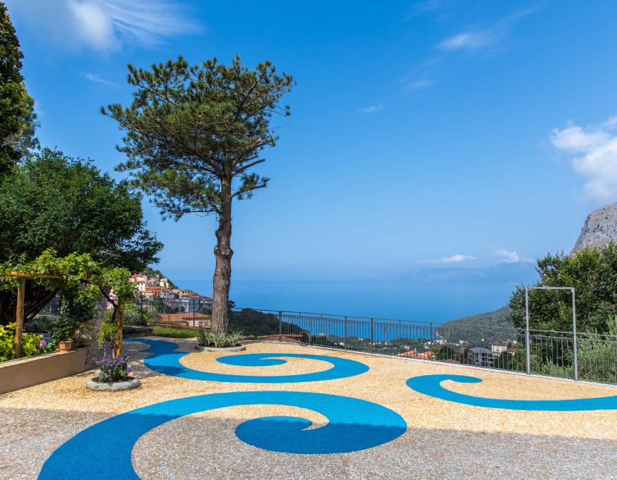 ItalianTerrazzo®, exposed aggregate paving giallo ocra and blu oltremare color. Giardino delle Arti, Maratea (Italy) Project Arch. Francesco Canestrini. 02