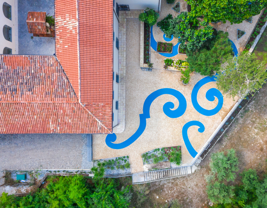 ItalianTerrazzo®, exposed aggregate paving giallo ocra and blu oltremare color. Giardino delle Arti, Maratea (Italy) Project Arch. Francesco Canestrini. 06