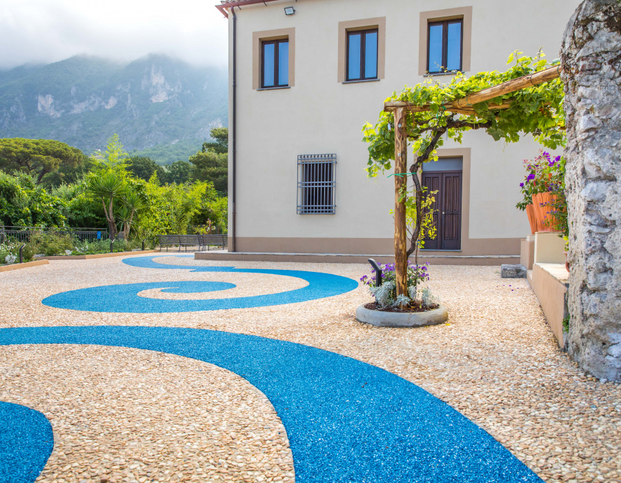 ItalianTerrazzo®, exposed aggregate paving giallo ocra and blu oltremare color. Giardino delle Arti, Maratea (Italy) Project Arch. Francesco Canestrini. 05