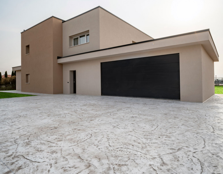 Plam Stampable, stamped concrete white color with light gray shades. Zané, Italy 04