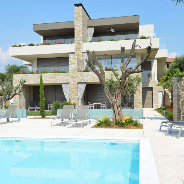 ItalianTerrazzo®, exposed aggregate floor, dune finish. Private residence, Bardolino, Italy